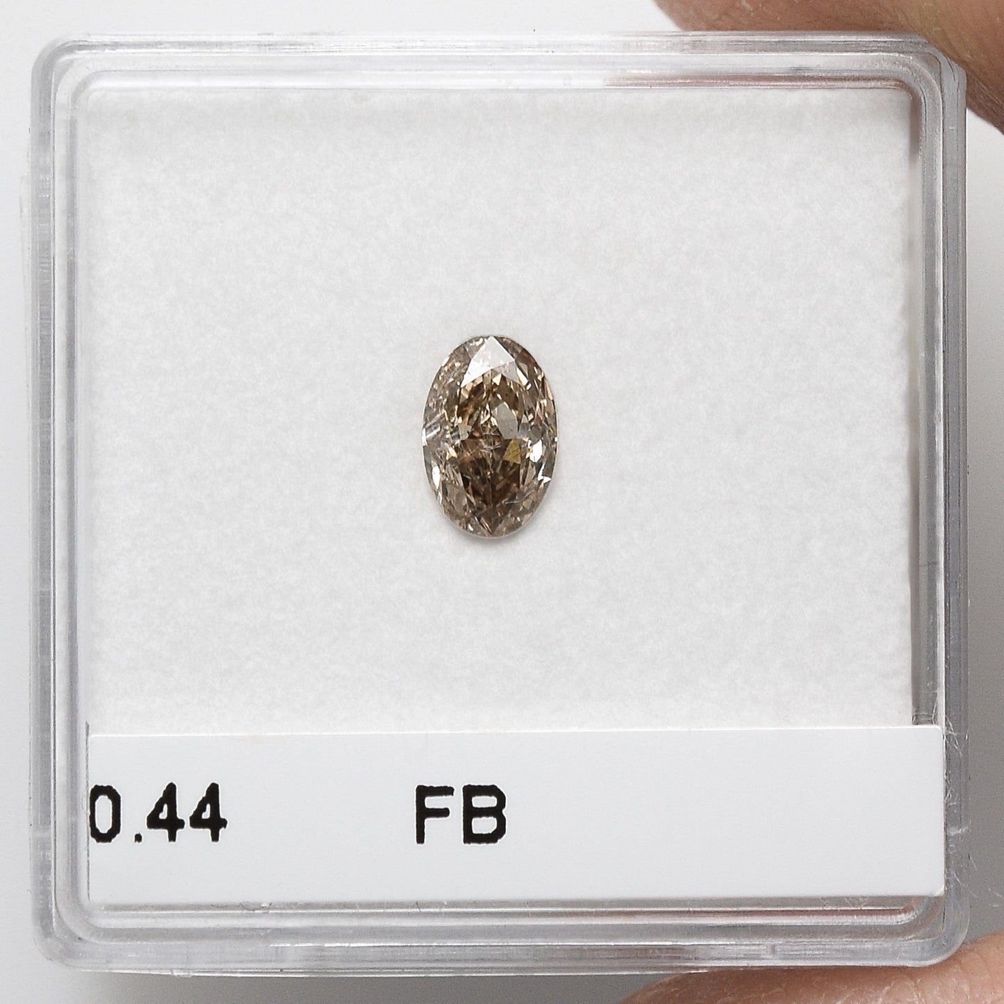 0,44 Karat Fancy Brown Ovaler Diamant (I1) GIA