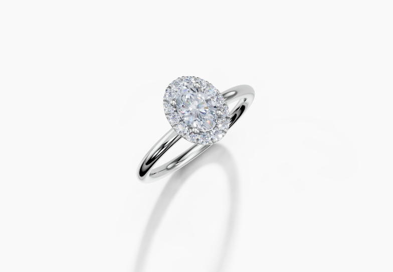 18K Oval 0.3 Carat G/H SI Plain Plain Single Halo Diamond Ring