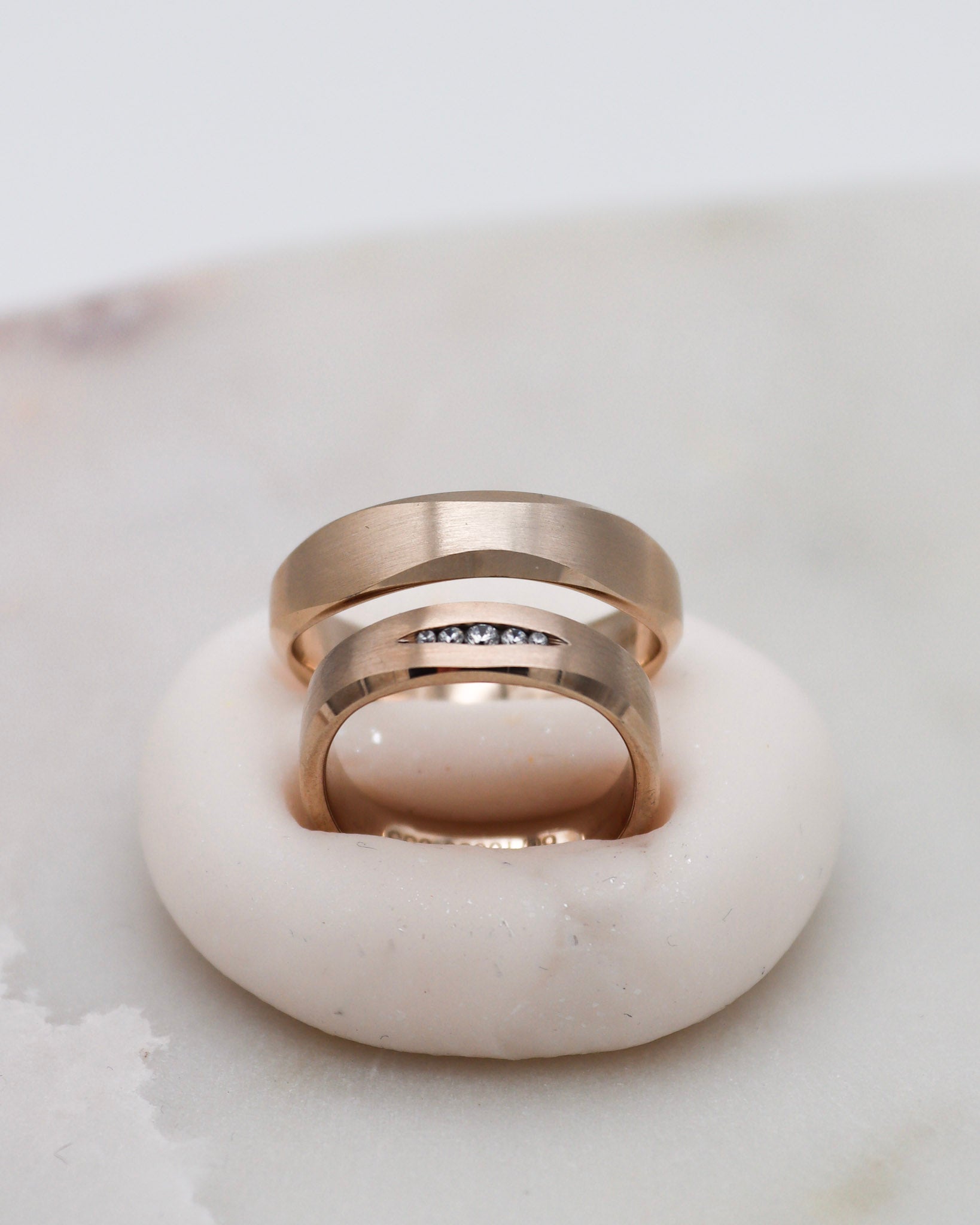 Wedding rings in angular design with diamonds and surface options