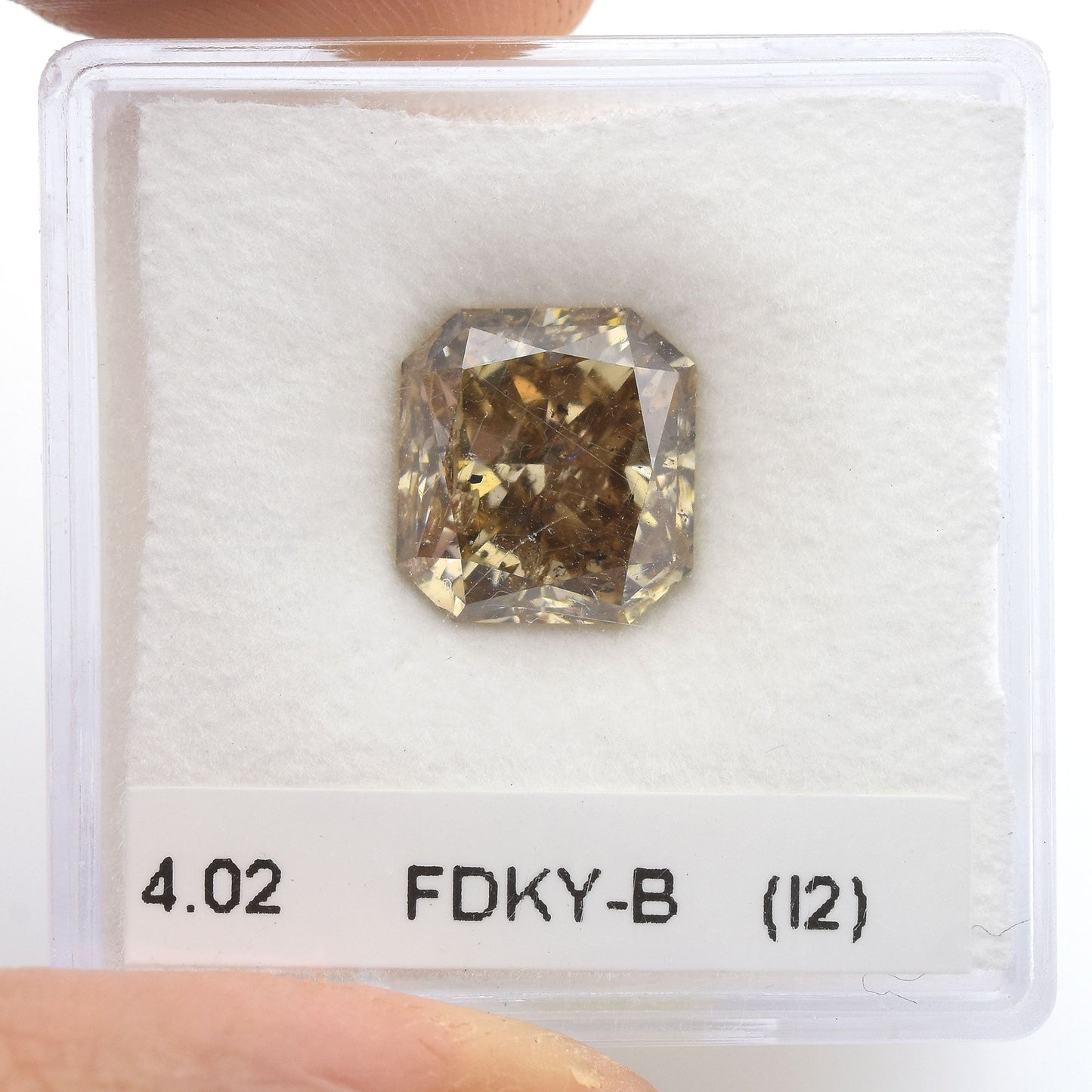 4,02 Karat Fancy Dark Yellowish Brown Radiant (I2) GIA