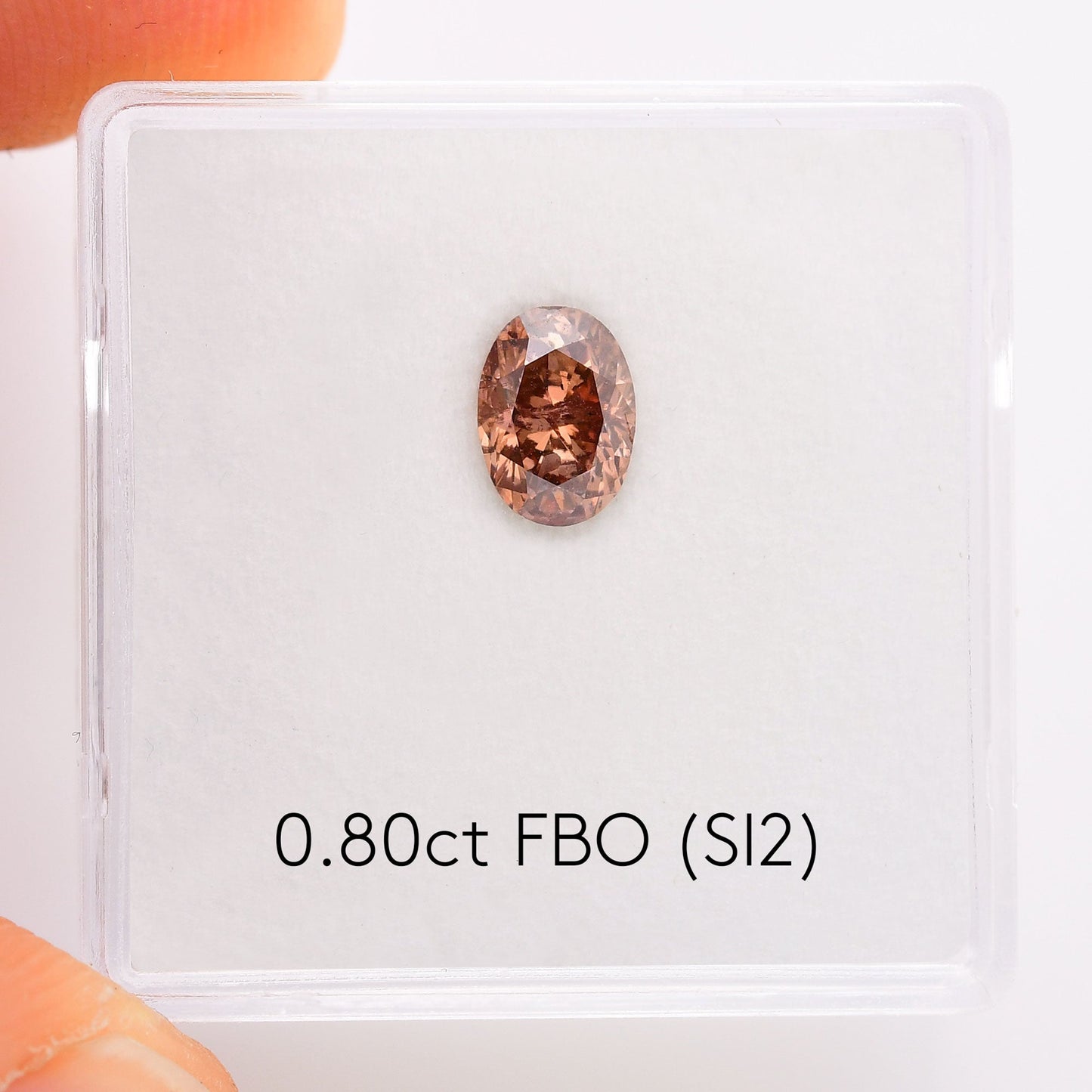 0,80 Karat Fancy Brown Orange Ovaler Diamant (SI2) GIA
