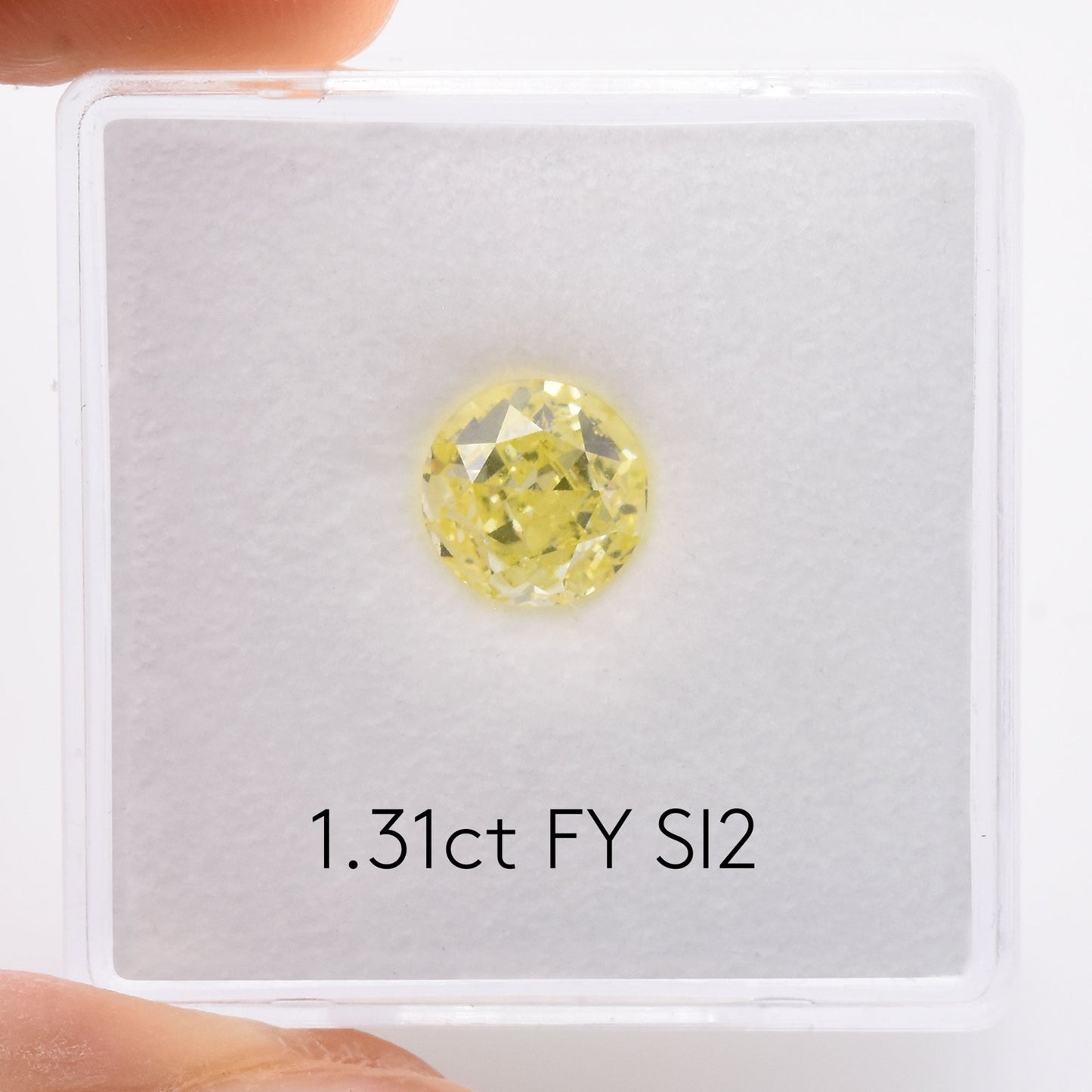 1,31 Karat Fancy Yellow Brillant, runder Diamant, SI2, GIA