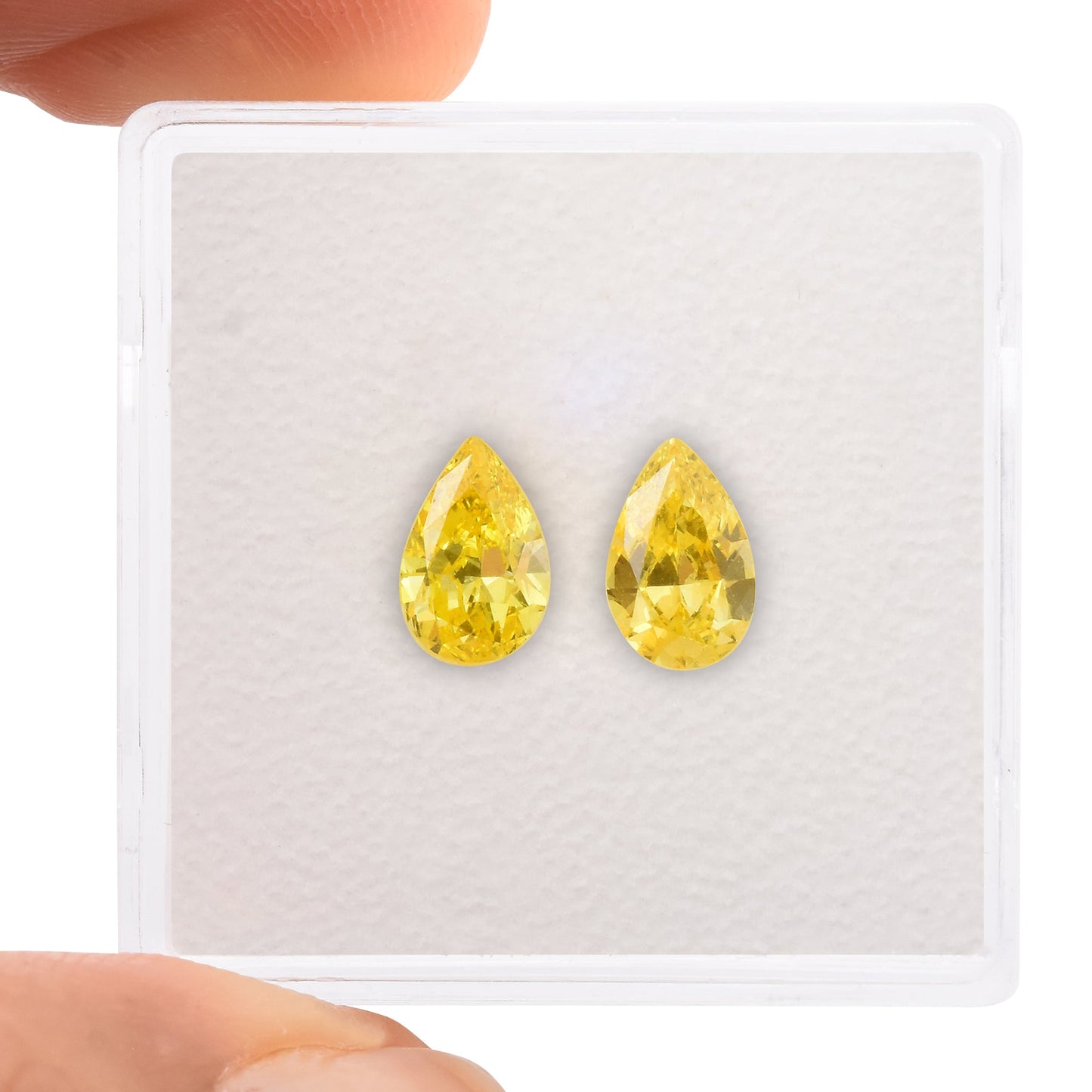 1,03 Karat Fancy Vivid Yellow Birnen-Diamanten SI1