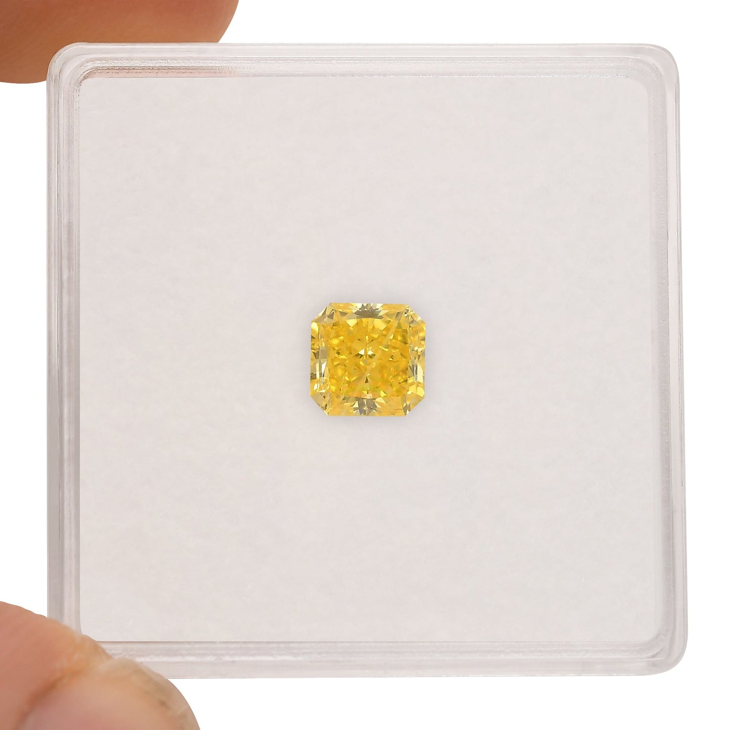 0.77 Carat Fancy Vivid Yellow Radiant Diamond SI2 GIA