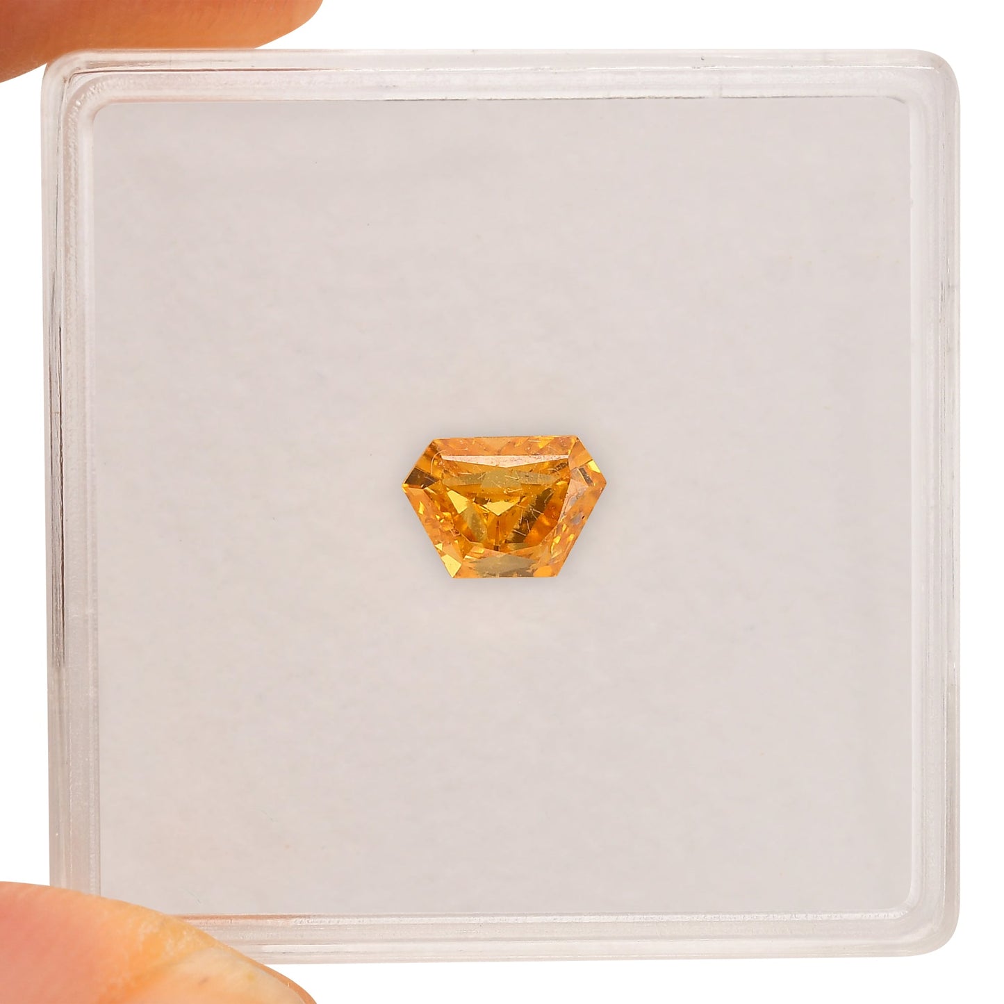 0.57 Carat Fancy Vivid Yellow Orange Trapezoid Diamond SI2 GIA