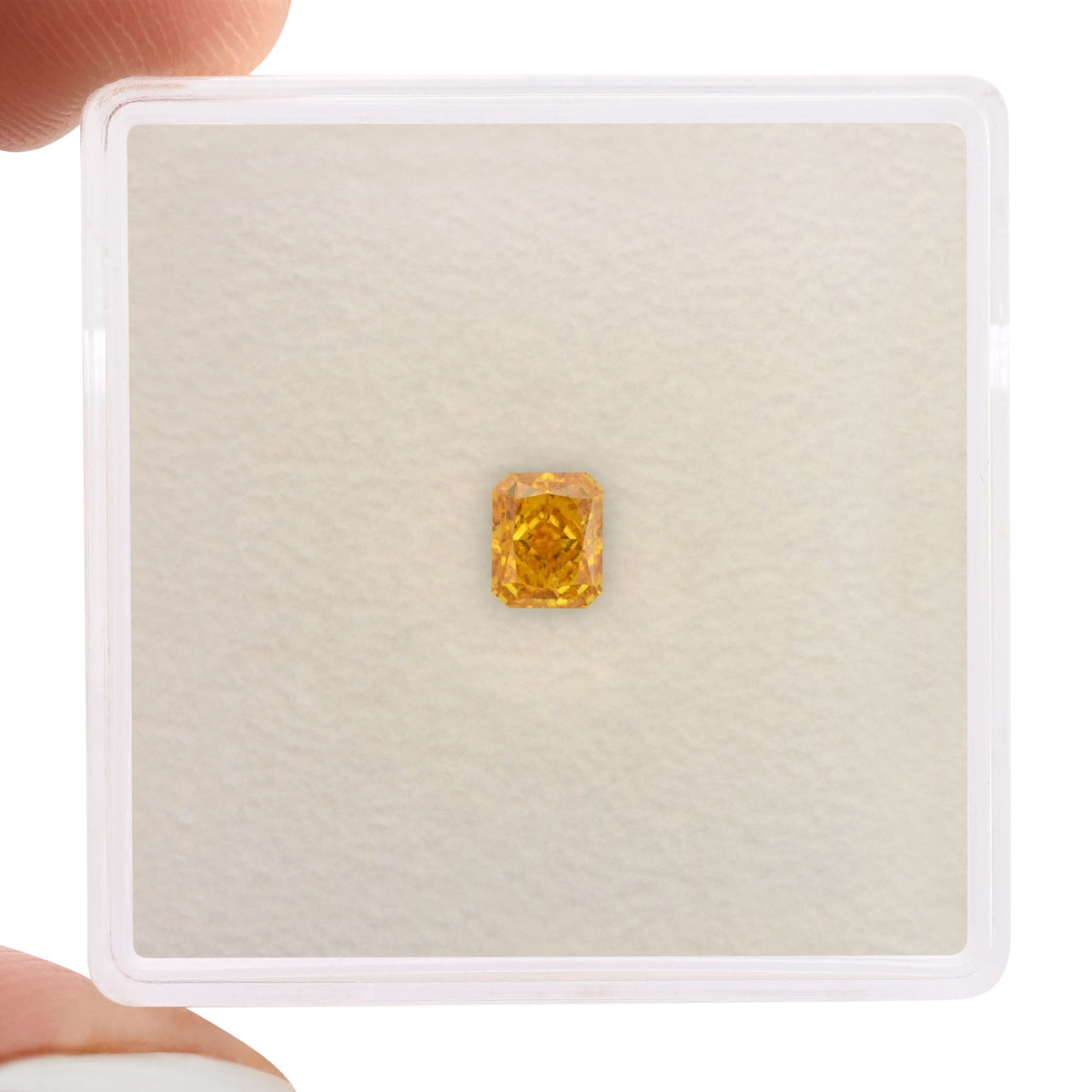 0.31 Carat Fancy Vivid Yellowish Orange Radiant Diamond VS2 GIA