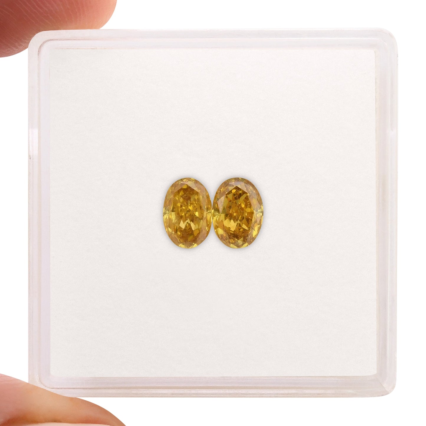 0,87 Karat Fancy Intense Orange Yellow Oval Diamonds (SI1)