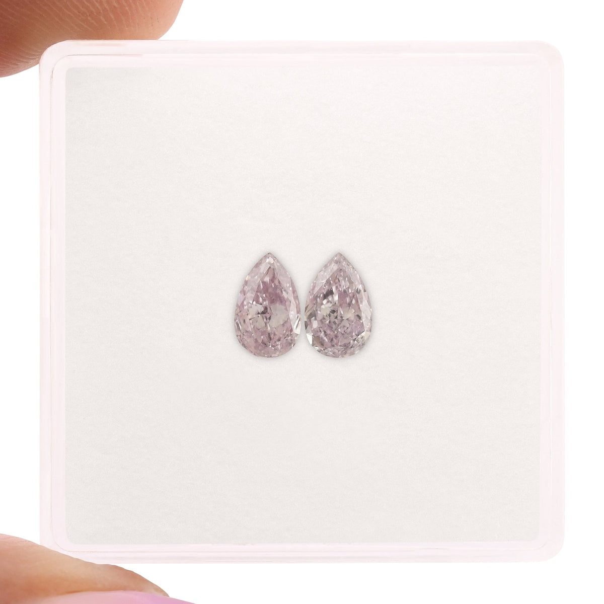 0.66 Carat Fancy Purple Pink Pear Diamonds SI1