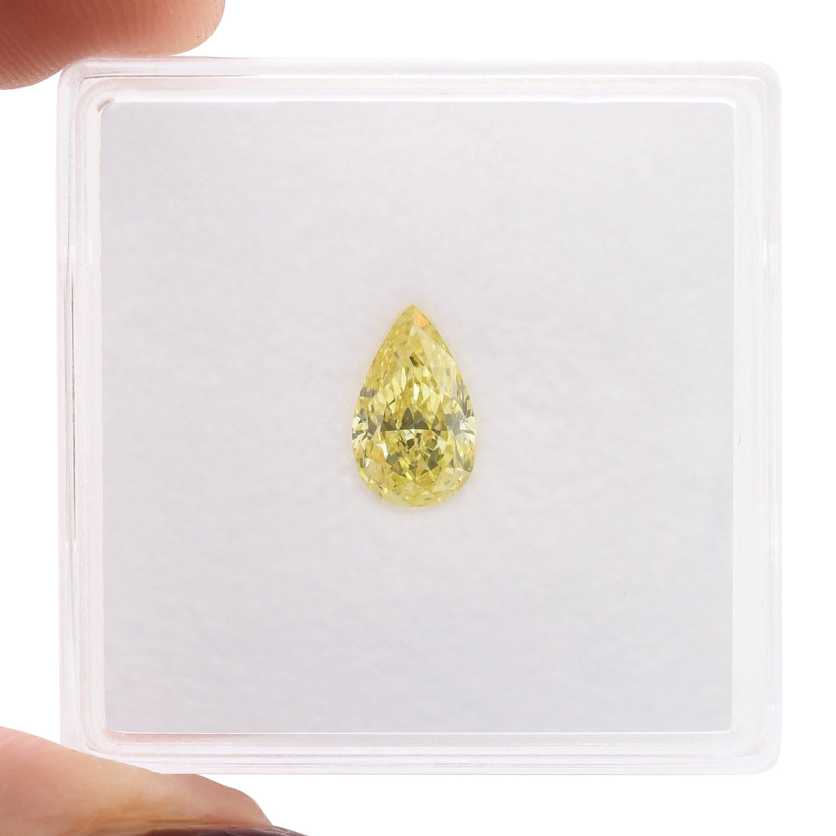0,78 Karat Fancy Intense Yellow Birnenförmiger Diamant VS2 GIA