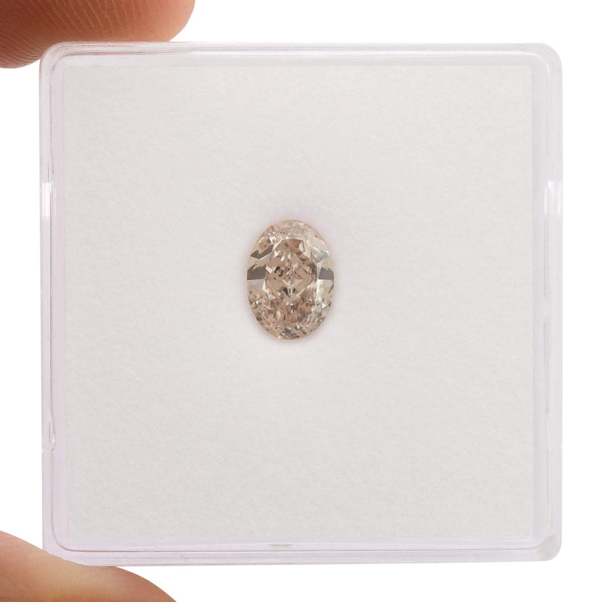 0,67 Karat Fancy Light Brownish Pink Oval Diamond IF GIA