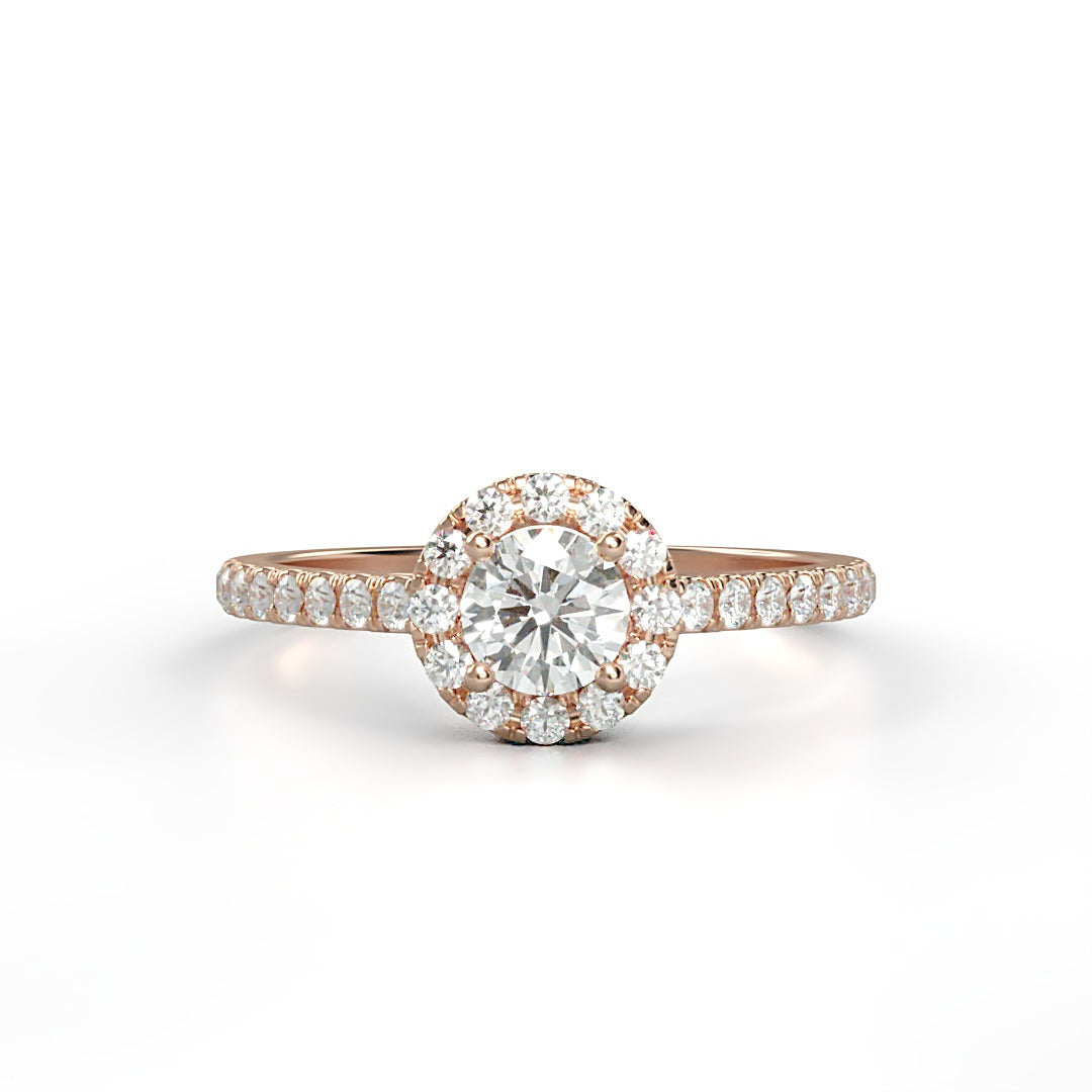 Verlobungsring Pauline mit 0.23 ct H/SI-Diamant im Halo, umrahmt von seitlichen Diamanten mit insgesamt 0.27 ct – erhältlich in München und Augsburg