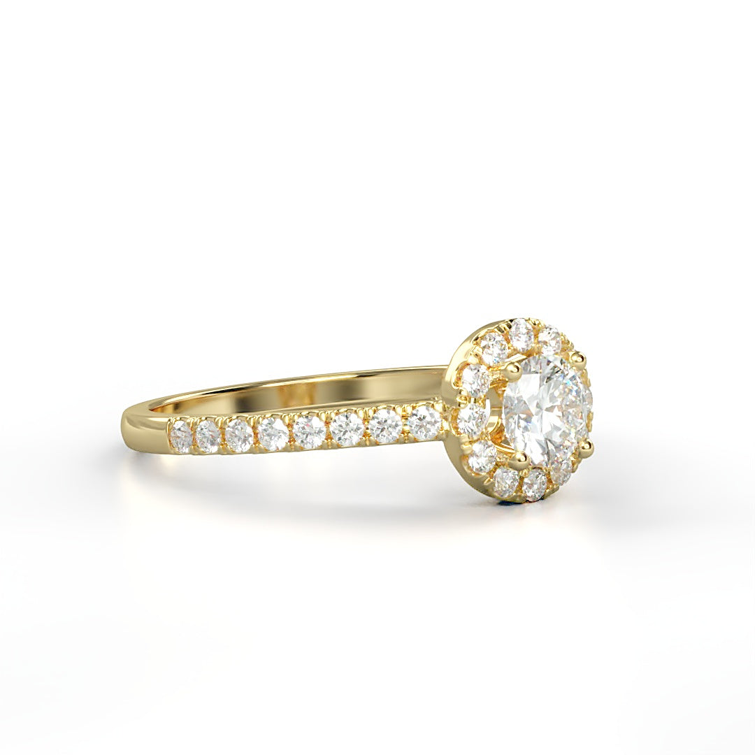 Verlobungsring Pauline mit 0.23 ct H/SI-Diamant im Halo, umrahmt von seitlichen Diamanten mit insgesamt 0.27 ct – erhältlich in München und Augsburg
