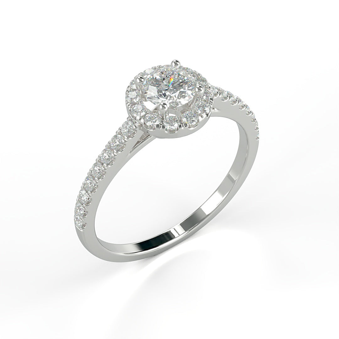 Verlobungsring Pauline mit 0.23 ct H/SI-Diamant im Halo, umrahmt von seitlichen Diamanten mit insgesamt 0.27 ct – erhältlich in München und Augsburg