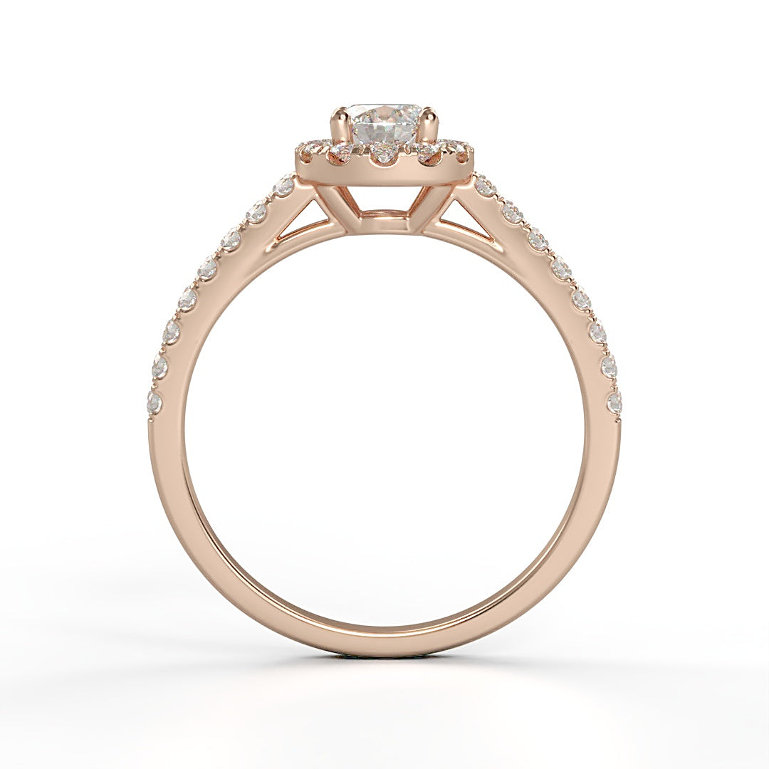 Verlobungsring Pauline mit 0.23 ct H/SI-Diamant im Halo, umrahmt von seitlichen Diamanten mit insgesamt 0.27 ct – erhältlich in München und Augsburg