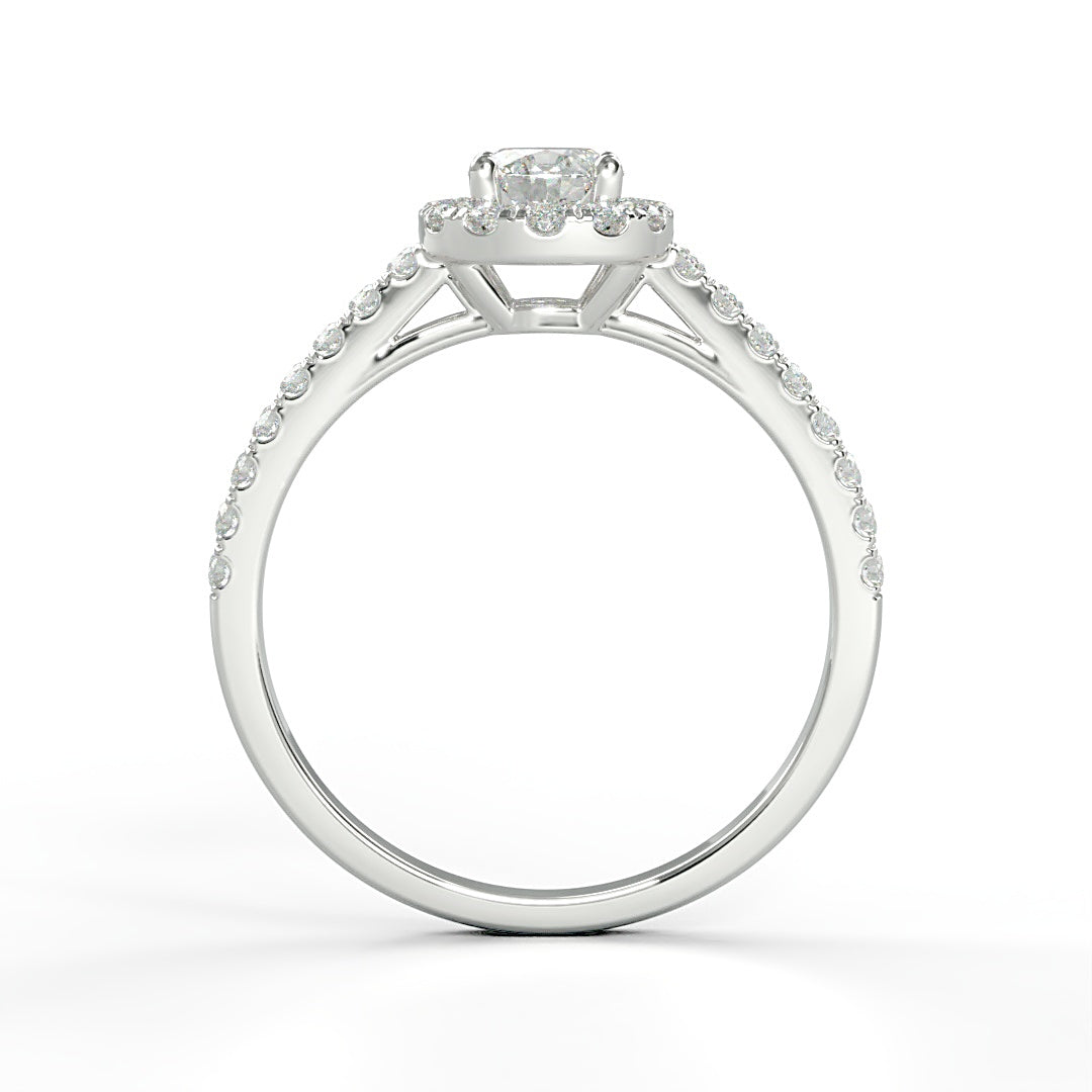 Verlobungsring Pauline mit 0.23 ct H/SI-Diamant im Halo, umrahmt von seitlichen Diamanten mit insgesamt 0.27 ct – erhältlich in München und Augsburg