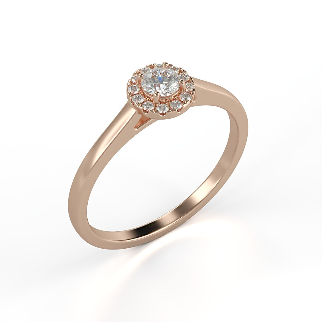 Verlobungsring Amelie mit 0.10 ct W/SI-Diamant, umrahmt von 0.05 ct H/SI-Diamanten im Halo – erhältlich in München und Augsburg