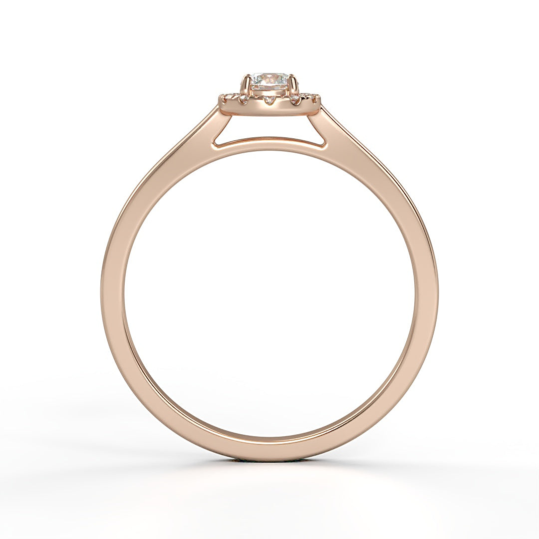 Verlobungsring Amelie mit 0.10 ct W/SI-Diamant, umrahmt von 0.05 ct H/SI-Diamanten im Halo – erhältlich in München und Augsburg