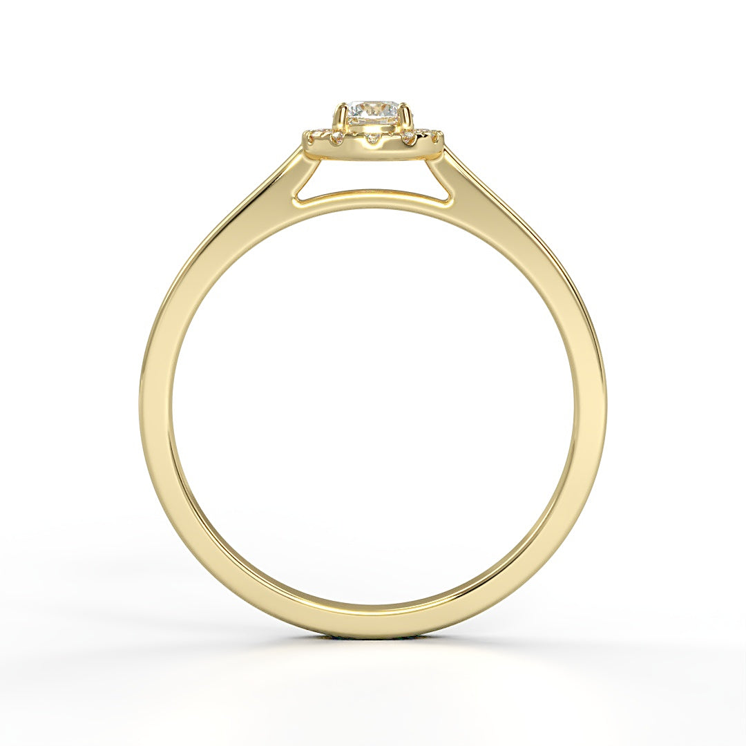 Verlobungsring Amelie mit 0.10 ct W/SI-Diamant, umrahmt von 0.05 ct H/SI-Diamanten im Halo – erhältlich in München und Augsburg