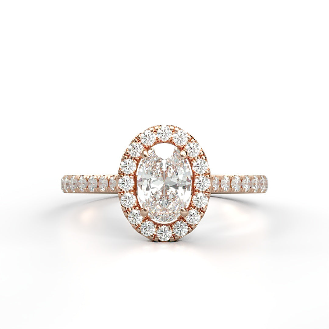 Verlobungsring Kelly mit 1.0 ct G/VS Oval-Cut Diamant, umrahmt von Halo und 0.5 ct seitlichen G/VS-Diamanten – erhältlich in München und Augsburg