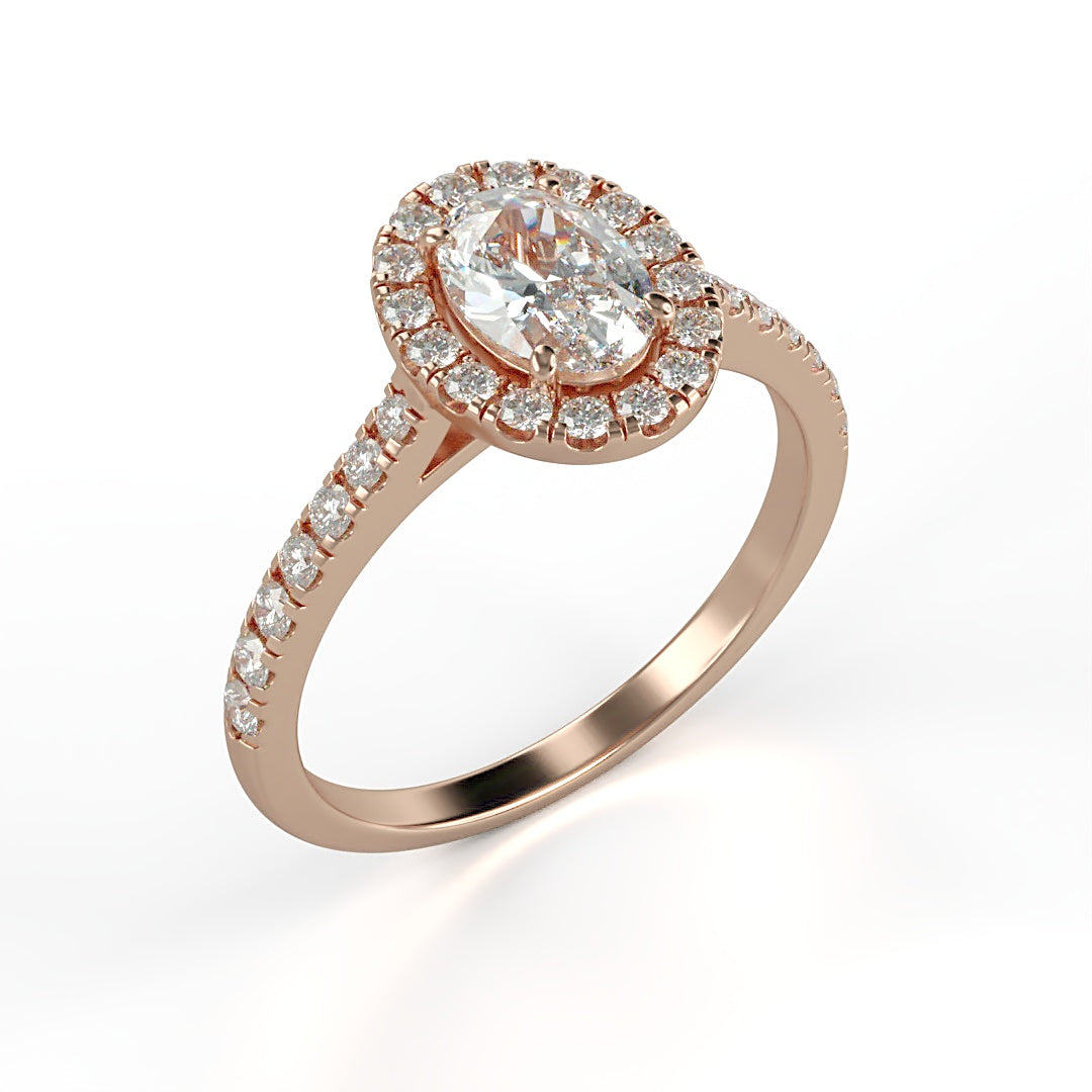 Verlobungsring Kelly mit 1.0 ct G/VS Oval-Cut Diamant, umrahmt von Halo und 0.5 ct seitlichen G/VS-Diamanten – erhältlich in München und Augsburg