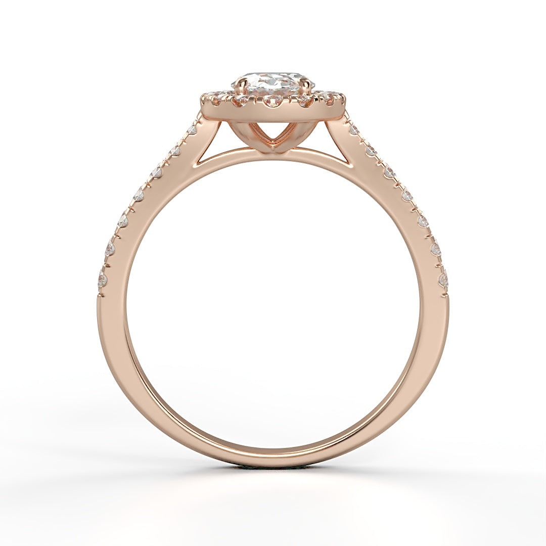 Verlobungsring Kelly mit 1.0 ct G/VS Oval-Cut Diamant, umrahmt von Halo und 0.5 ct seitlichen G/VS-Diamanten – erhältlich in München und Augsburg