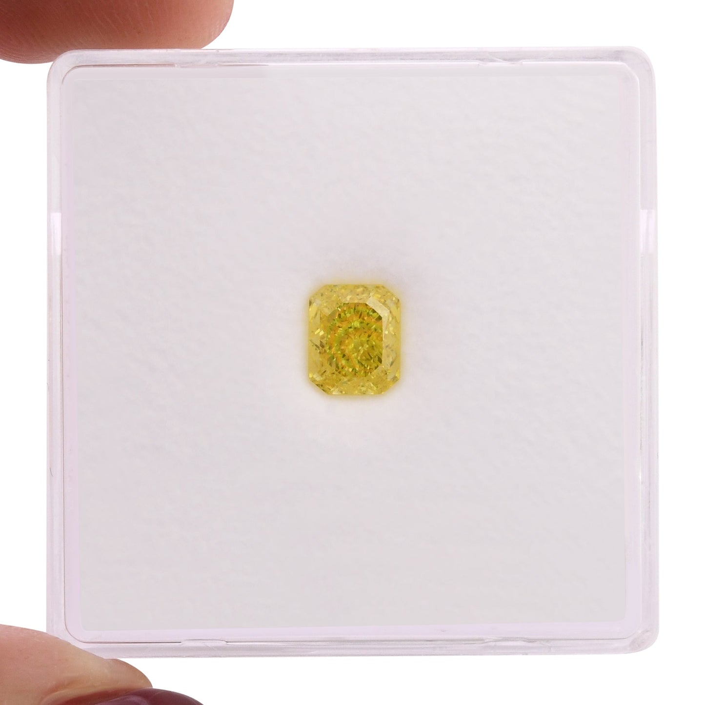 0.60 Carat Fancy Vivid Yellow Radiant Diamond VVS1 GIA