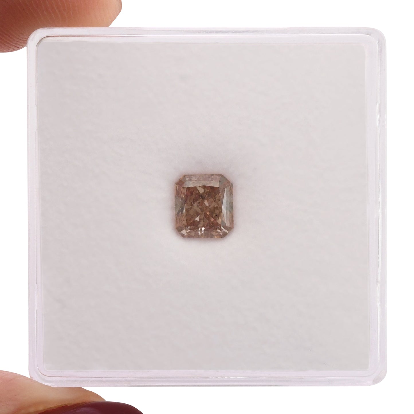 0.69 Carat Fancy Orangy Pink Radiant Diamond SI1 GIA