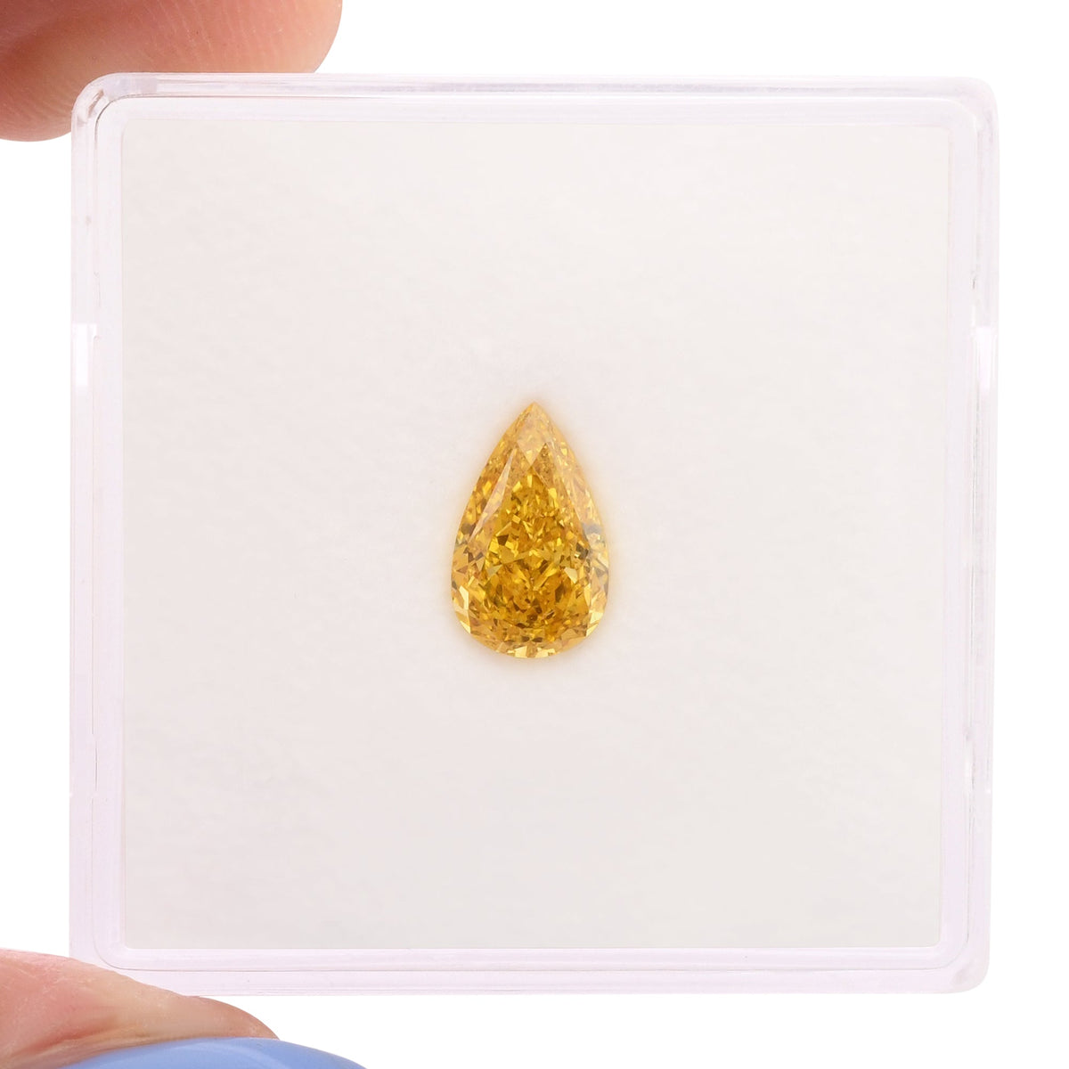 Birnenförmiger Diamant | 0,76 ct | Fancy Vivid Yellow Orange | VVS1 | GIA | Ref 714840