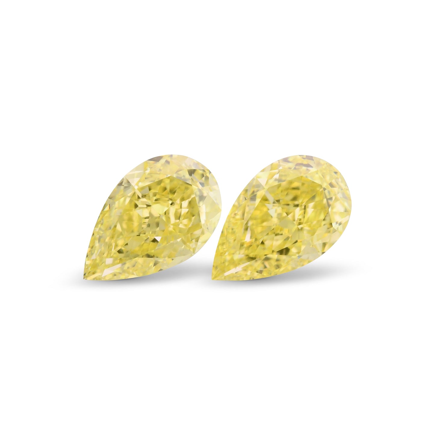 1.04 Carat Fancy Intense Yellow Pear Diamonds VS2 and VS2 GIA Pair