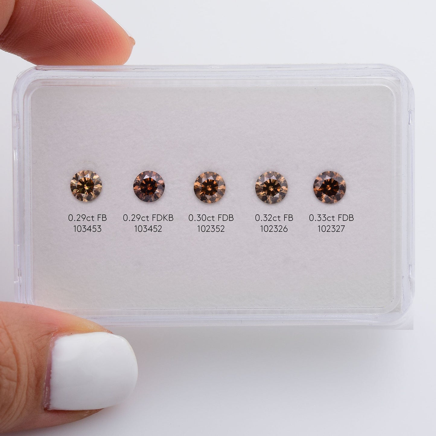 0,33 Karat Fancy Deep Brown Rundbrillanter Diamant VS2 IGI