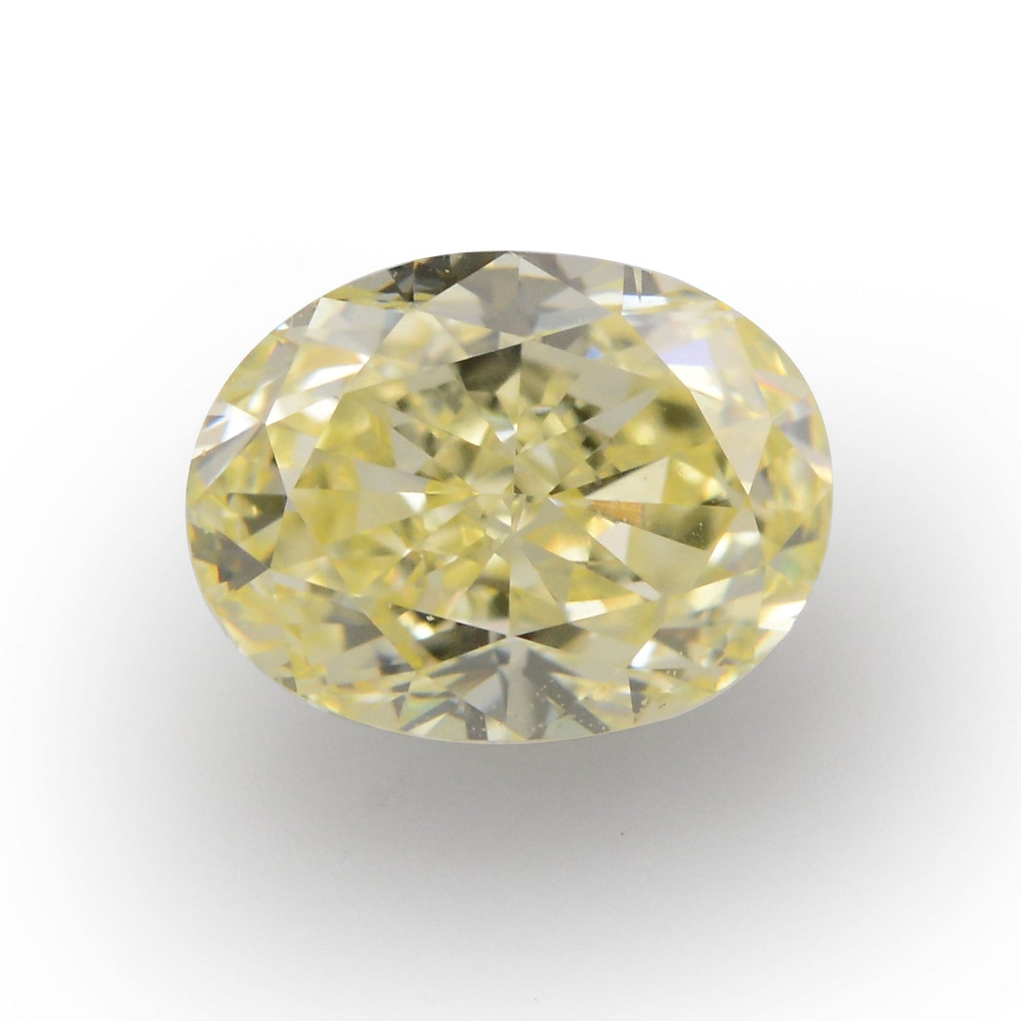 0,74 Karat Fancy Light Yellow Oval Diamond SI1 GIA