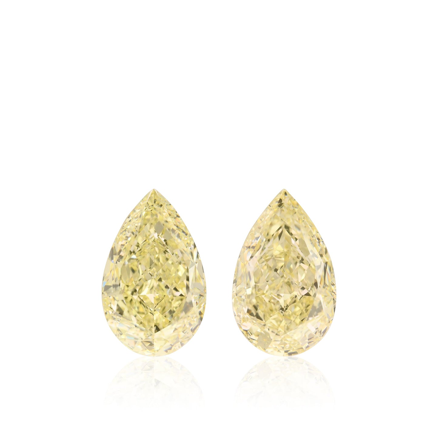 12.06 Carat Light Yellow Pear Diamonds VS1 GIA Pair