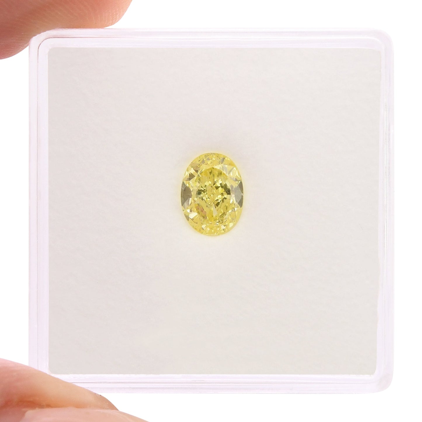0,77 Karat Fancy Intense Yellow Oval Diamond VS2 GIA