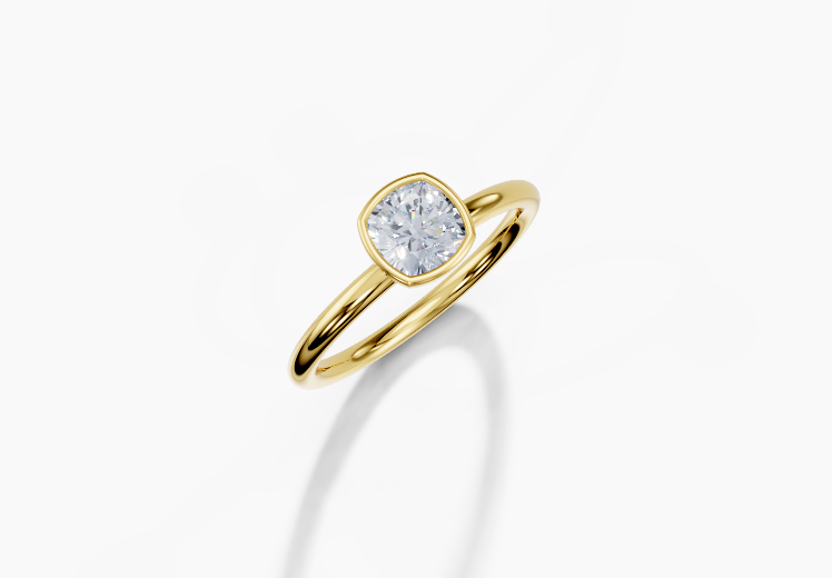 18K Cushion 0.7 Carat G/H SI Plain Plain Bezel Diamond Ring