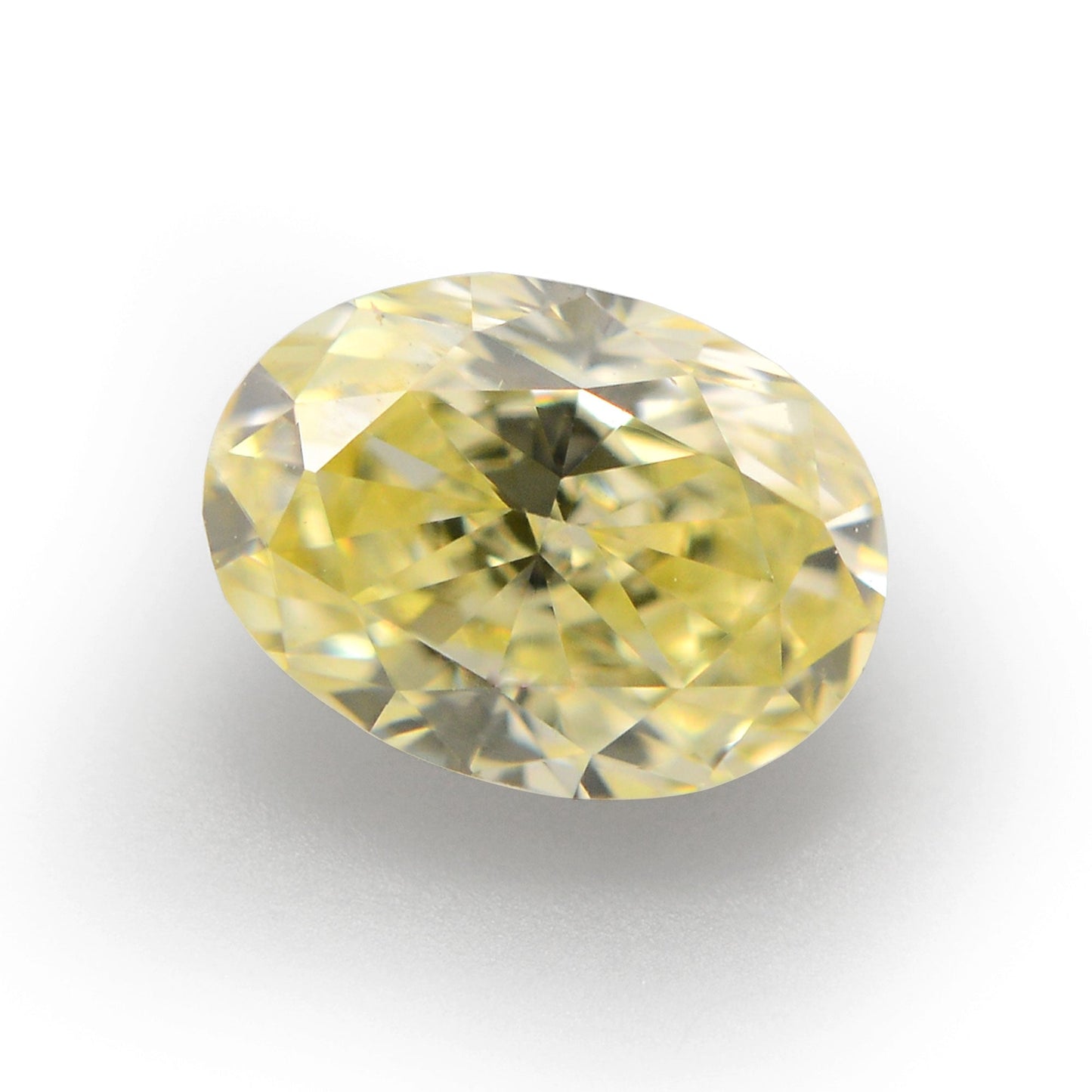 0,34 Karat Fancy Yellow Oval Diamond VVS2 IGI