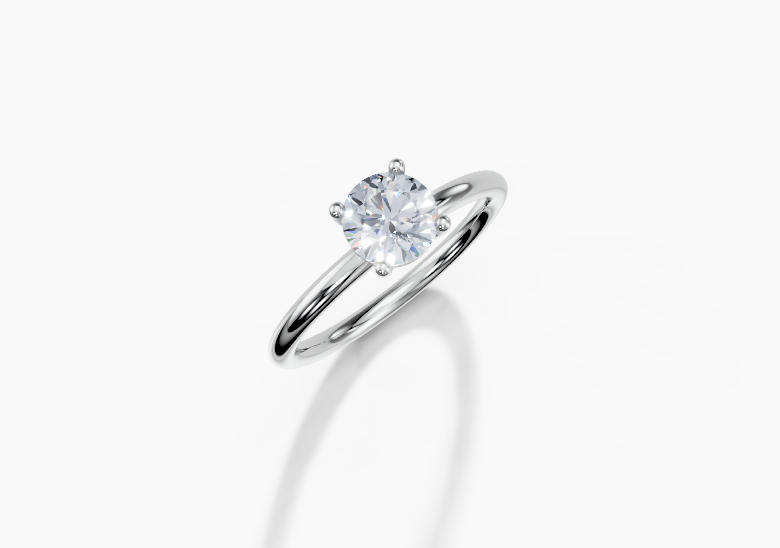 Platinum Round 0.7 Carat G/H SI Plain Plain 4Pr Diamond Ring