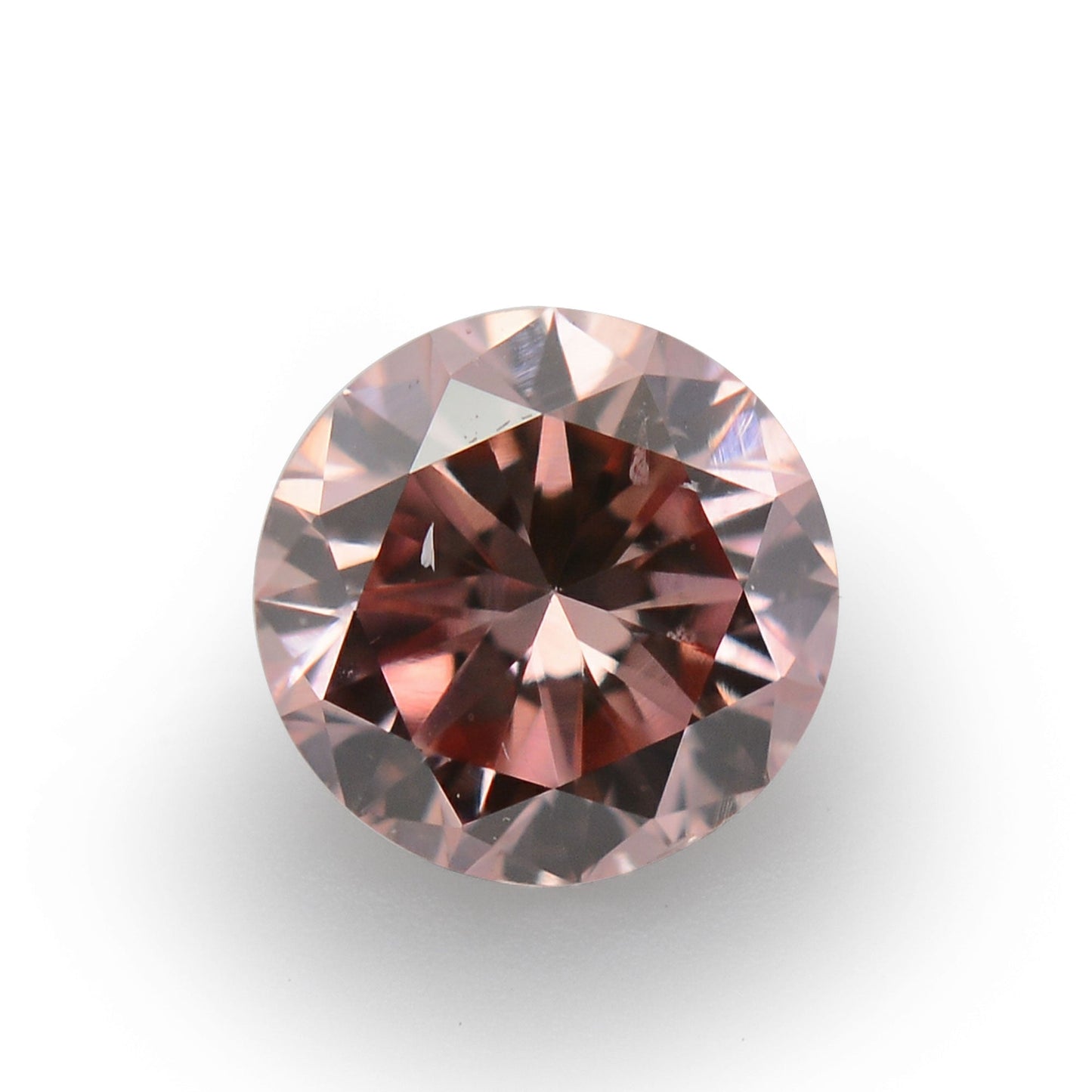 0,21 Karat Fancy Orange Pink Brillant, rund, SI1, GIA