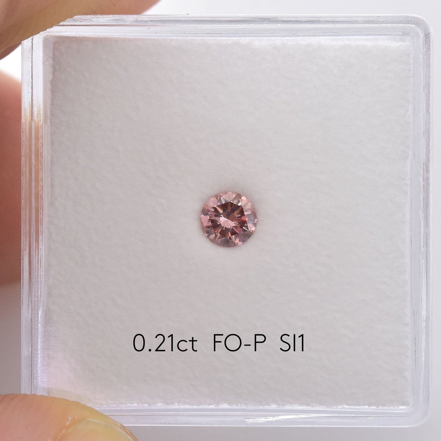 0,21 Karat Fancy Orange Pink Brillant, rund, SI1, GIA