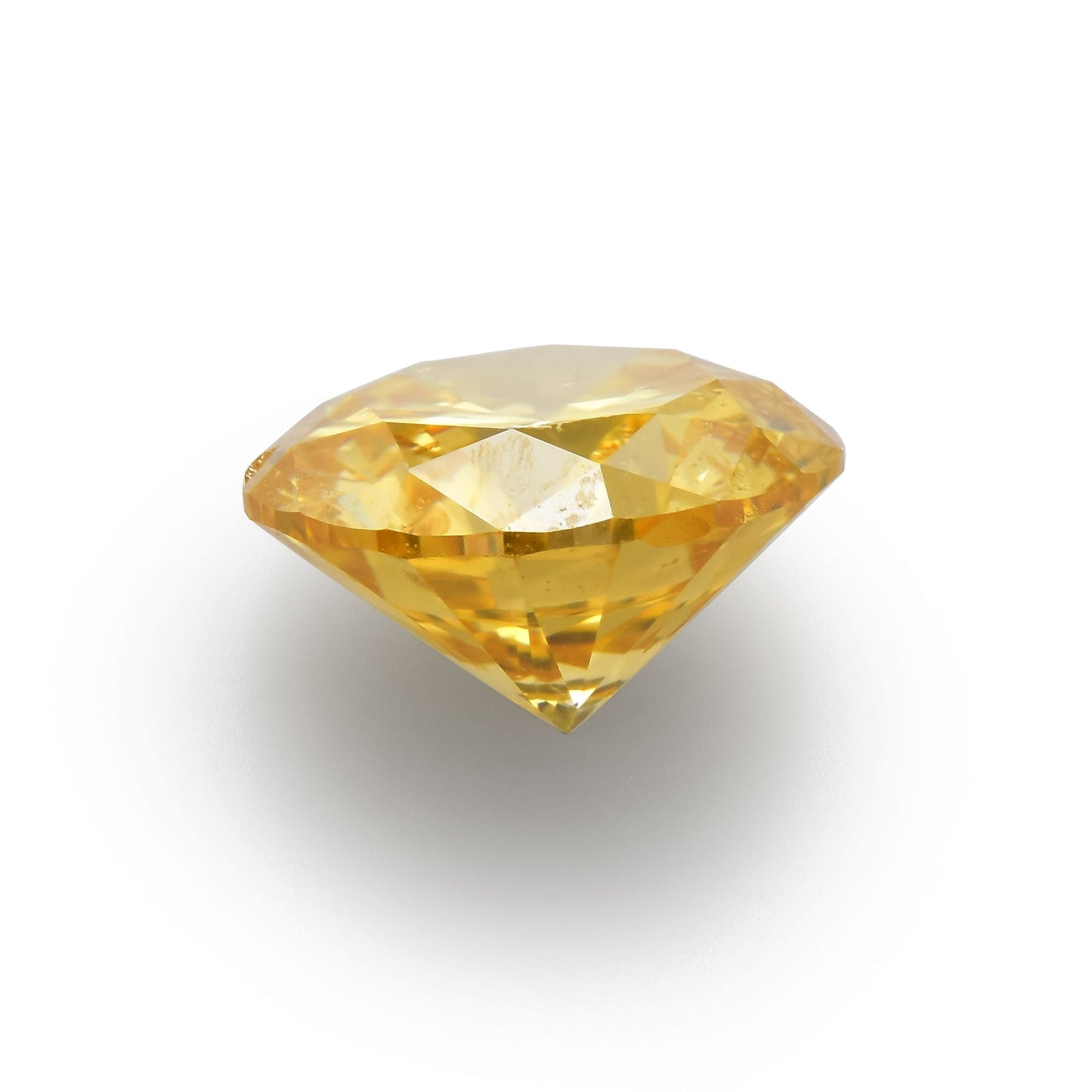 0,65 Karat Fancy Brownish Orange Yellow Round Brilliant (I1) GIA