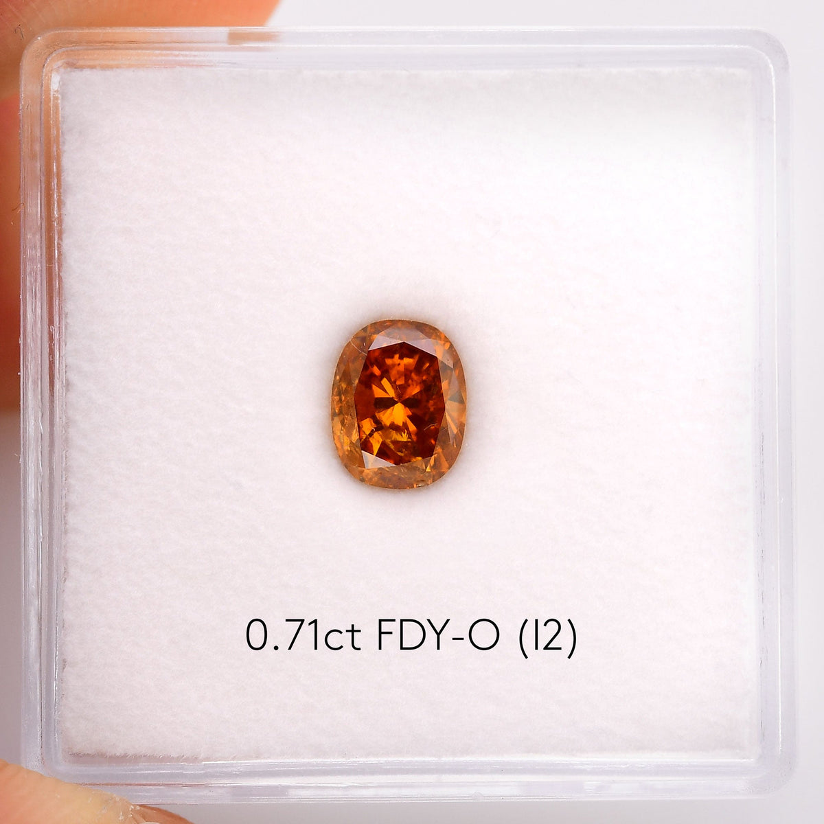 0.71 Carat Fancy Deep Yellowish Orange Cushion Diamond (I2) GIA
