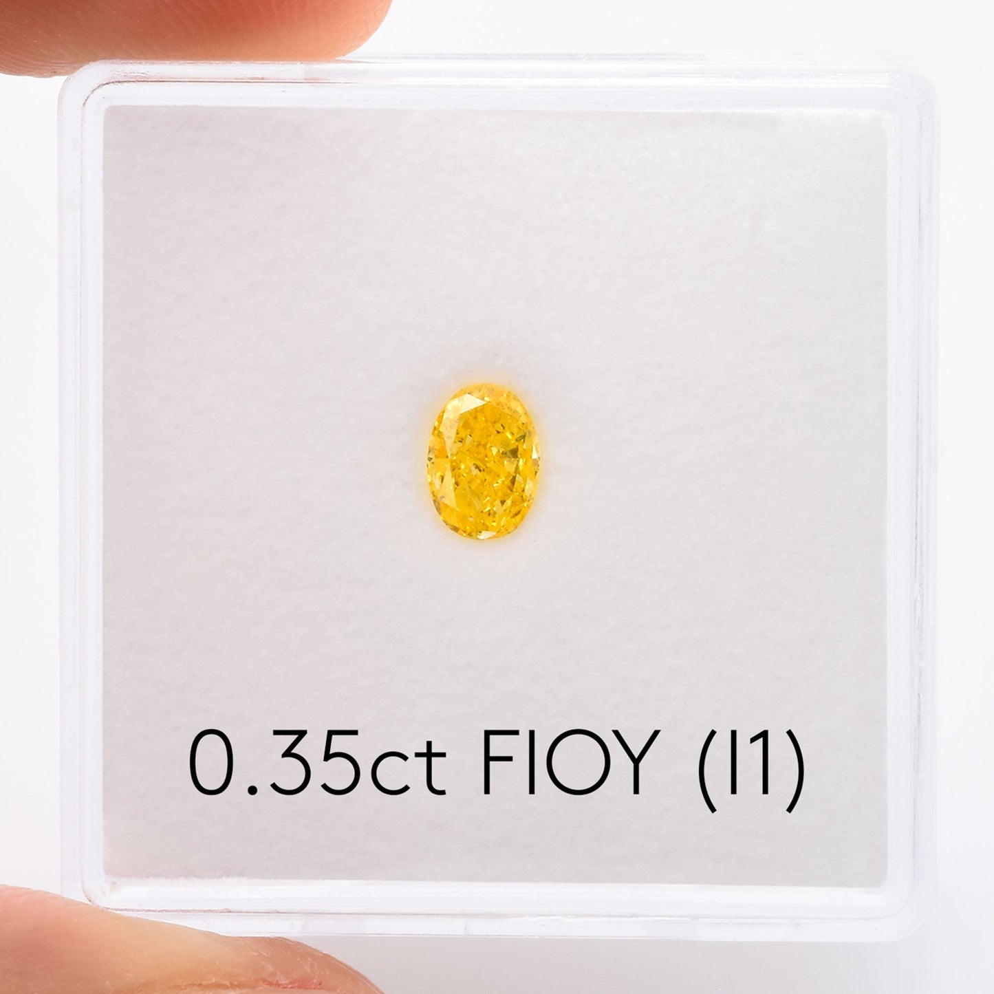 0,35 Karat Fancy Intense Orange Yellow Ovaler Diamant (I1) GIA