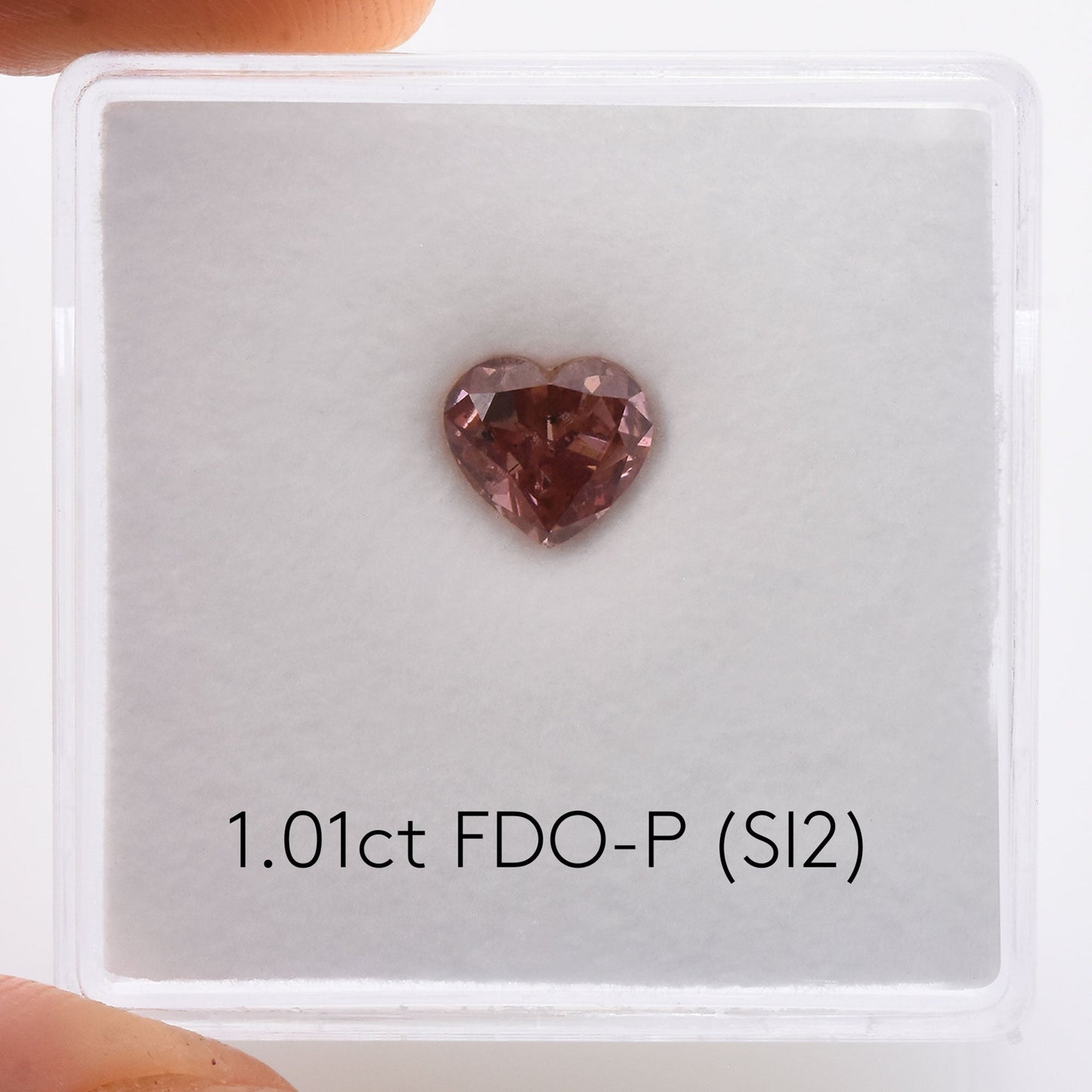 1,01 Karat Fancy Deep Orange Pink Heart Diamant (SI2) GIA