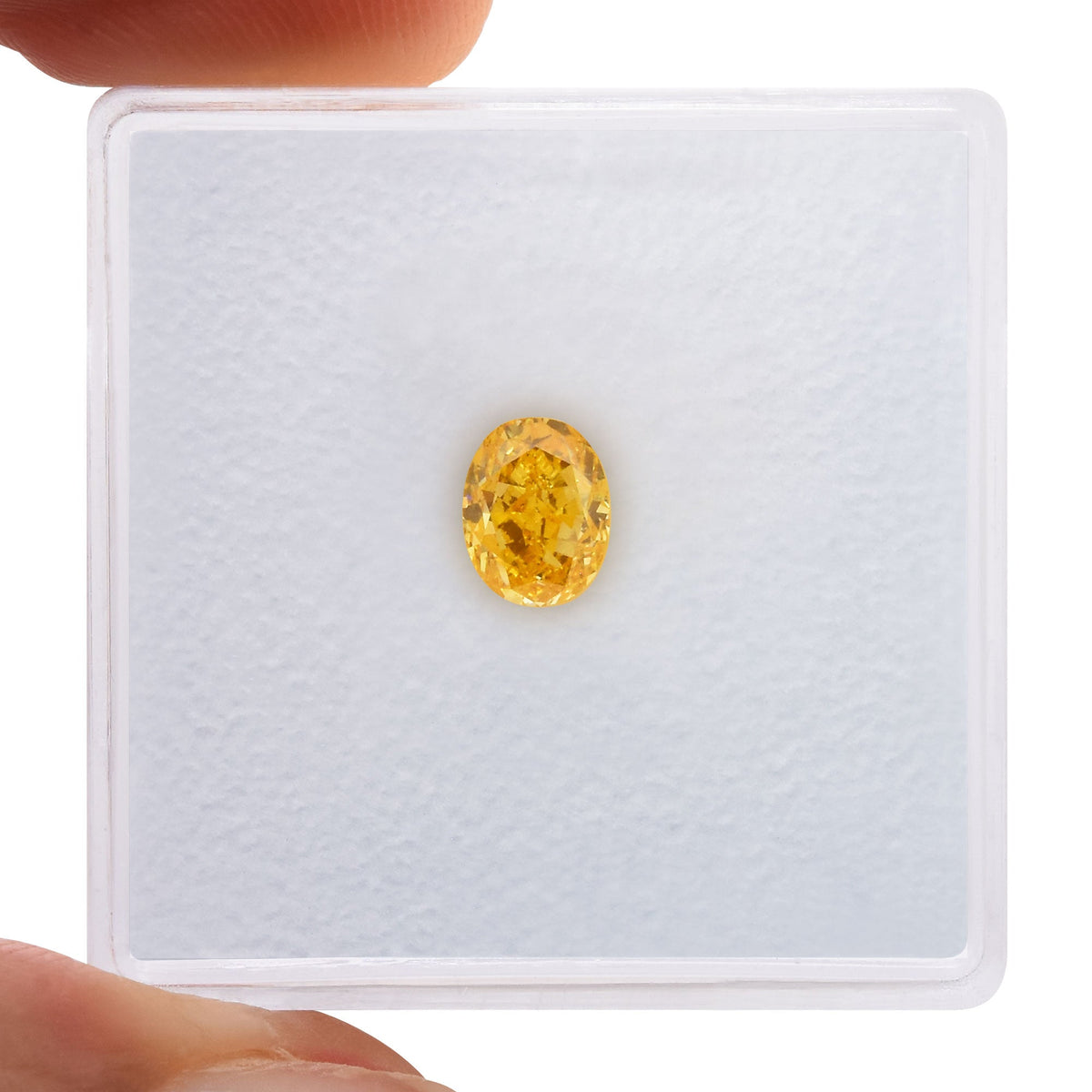 0,57 Karat Fancy Intense Yellow Orange Ovaler Diamant VS2 GIA