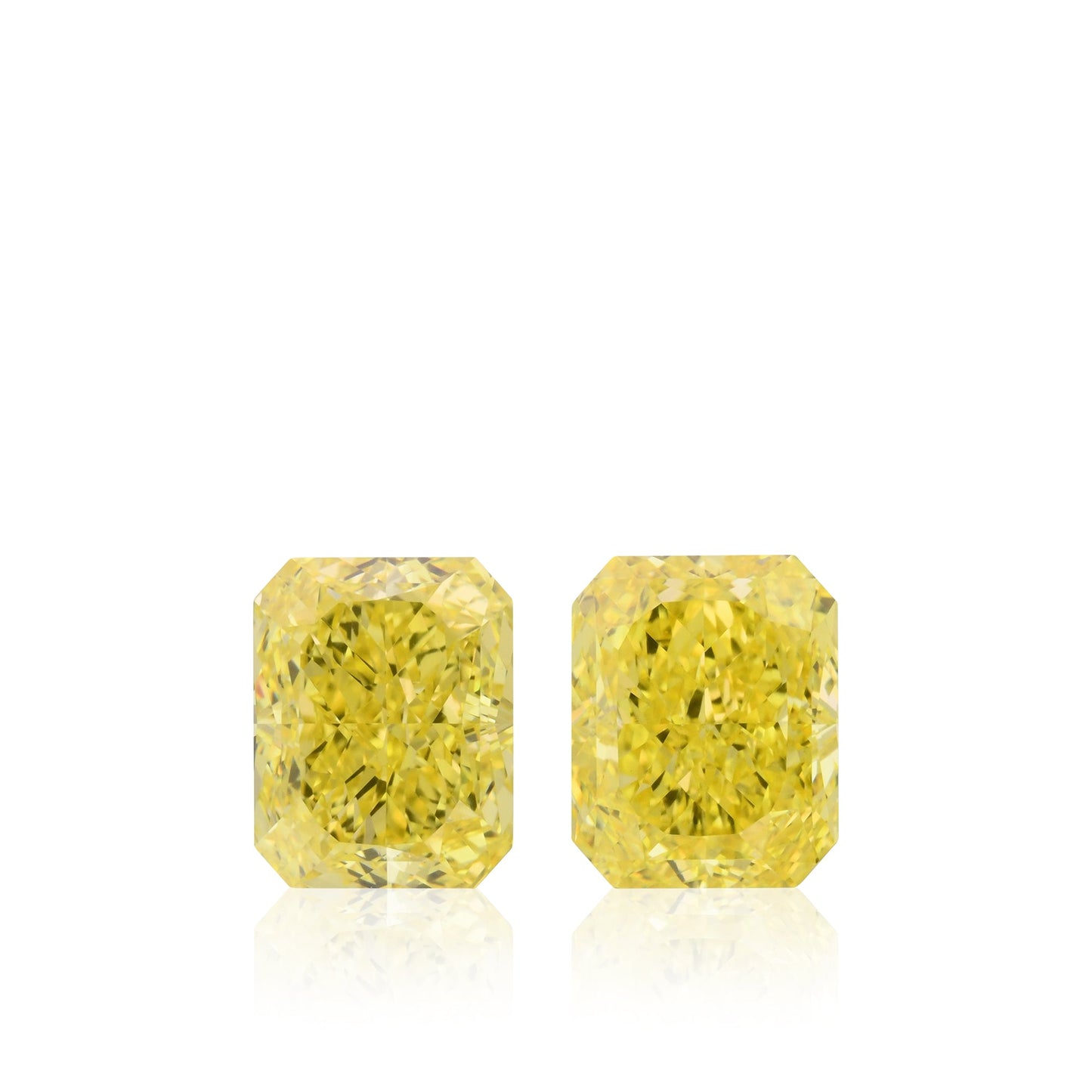 4.02 Carat Fancy Vivid Yellow Radiant Diamonds VS1 and VVS2 GIA Pair