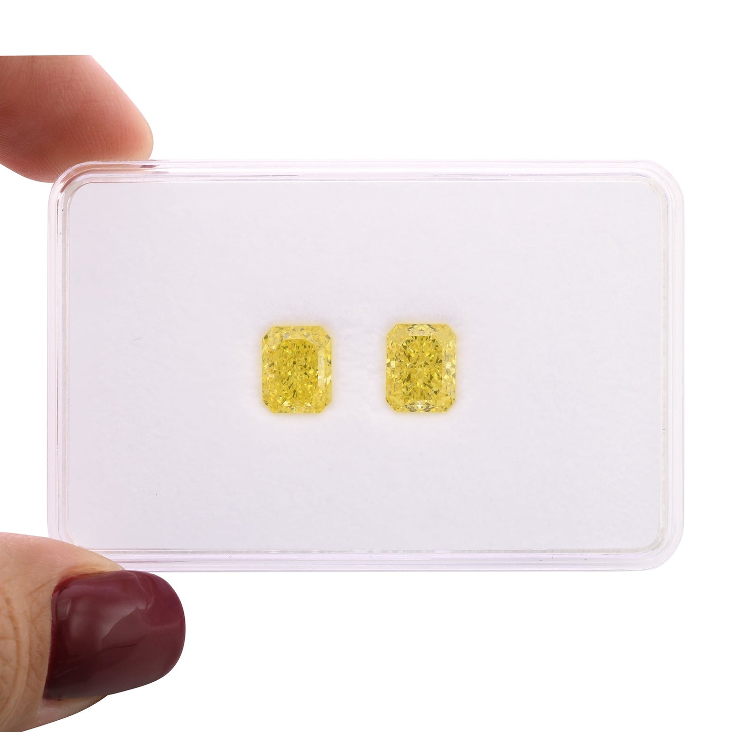 4.02 Carat Fancy Vivid Yellow Radiant Diamonds VS1 and VVS2 GIA Pair