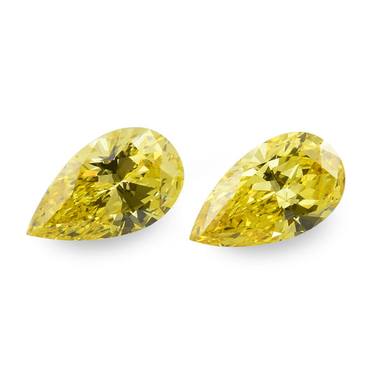 0,63 Karat Fancy Vivid Yellow Birnen-Diamanten VVS2