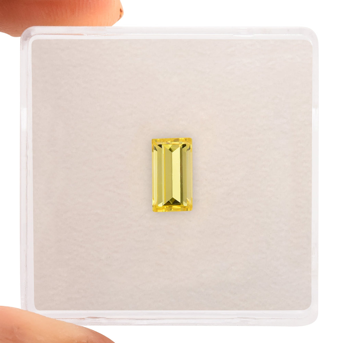 0,70 Karat Fancy Vivid Yellow Baguette-Diamant VS1 GIA