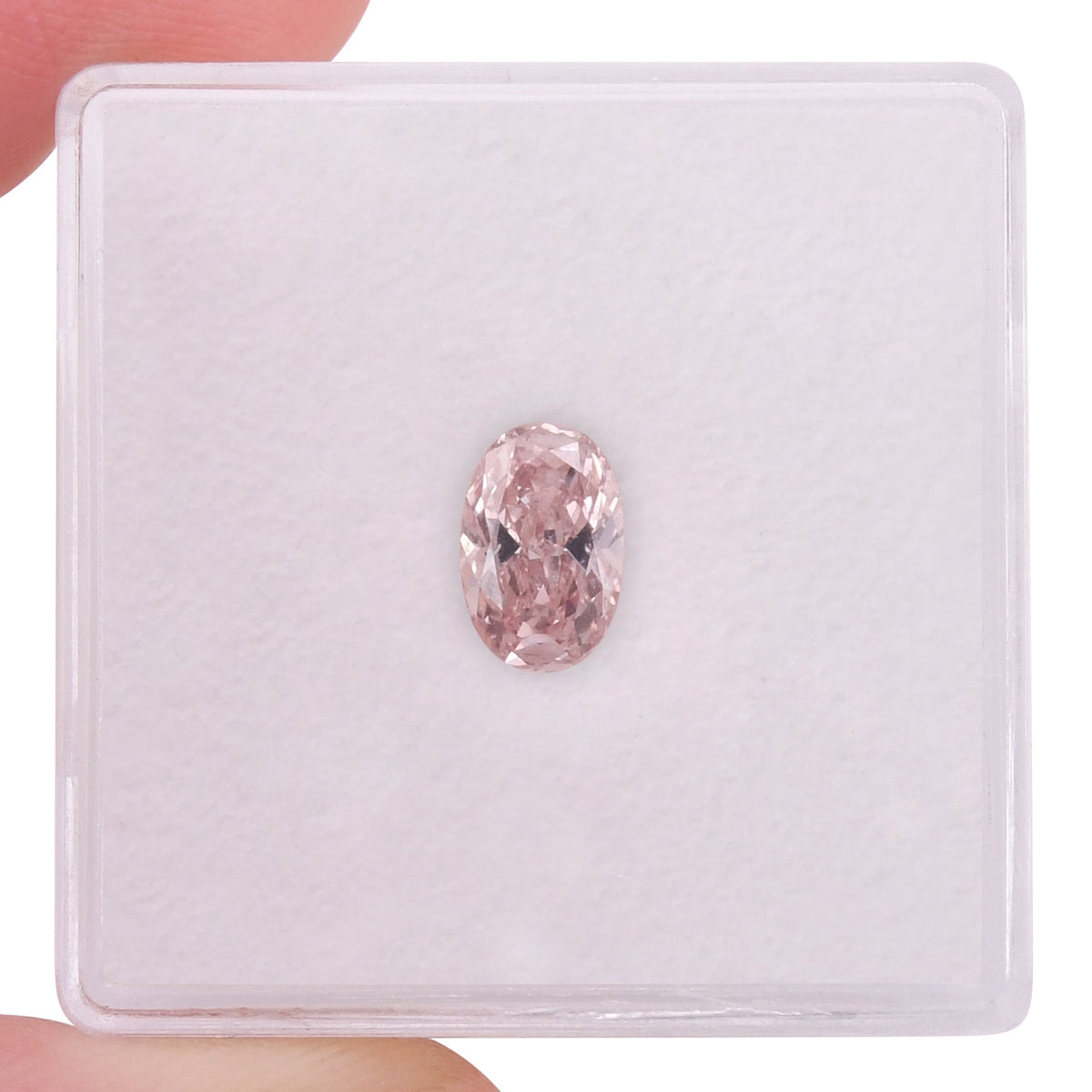 0.72 Carat Fancy Orangy Pink Oval Diamond SI2 GIA