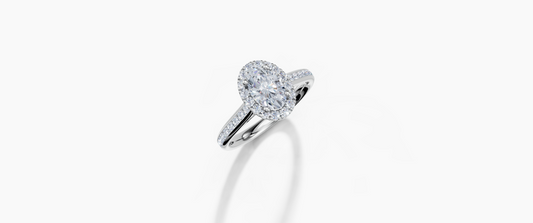 18K Oval 0.7 Carat E/F VS Cathedral Channel Single Halo Diamond Ring
