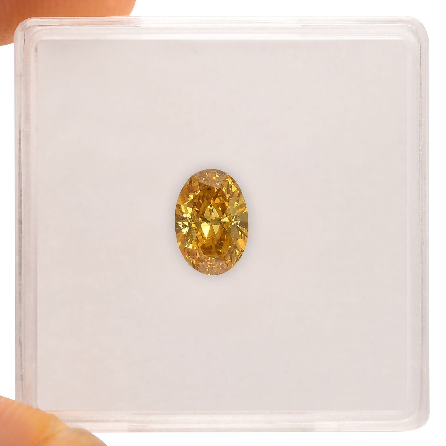 0,77 Karat Fancy Deep Brownish Orange Yellow Oval Diamond (VS2) GIA